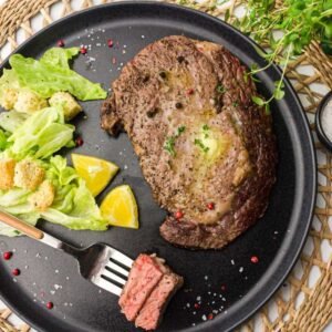 Air Fryer Steak on a black plate