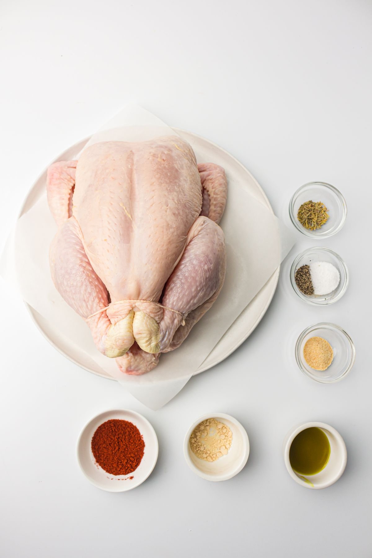 Ingredients for air frying a whole chicken.