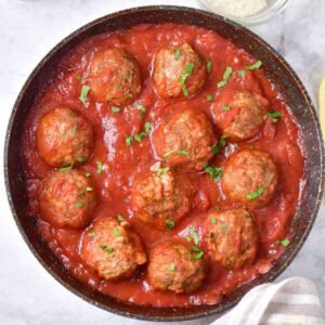 Baked Meatballs with Marinara Sauce in a pan