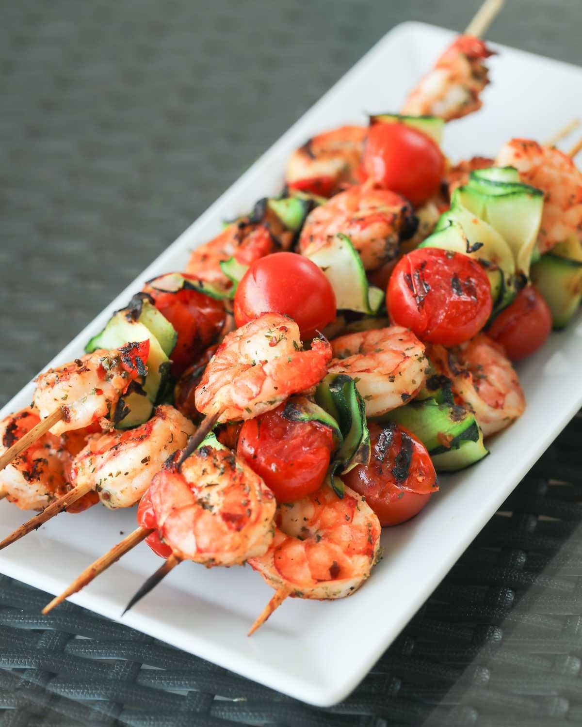 Barbecued Shrimp Skewers in a white platter